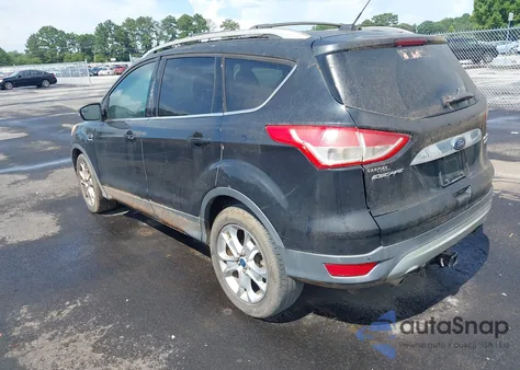2014 Ford Escape Titanium z USA, uszkodzony, nr VIN 1FMCU0J99EUA27367
